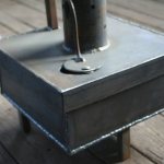 For at spare på opvarmning af et lille bryggers kan du bygge en gør-det-selv-ovn til at arbejde ud