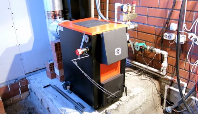 Pag-install ng isang solidong fuel boiler na may piping