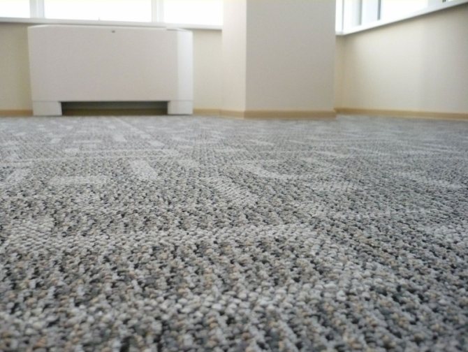 Gør-det-selv varmt gulv under tæppe på et trægulv