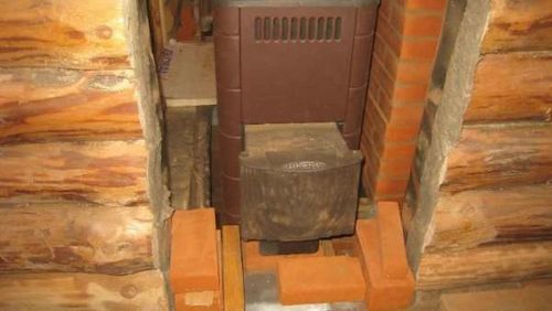 Installation af komfur i et badehus på et trægulv: trin for trin instruktioner