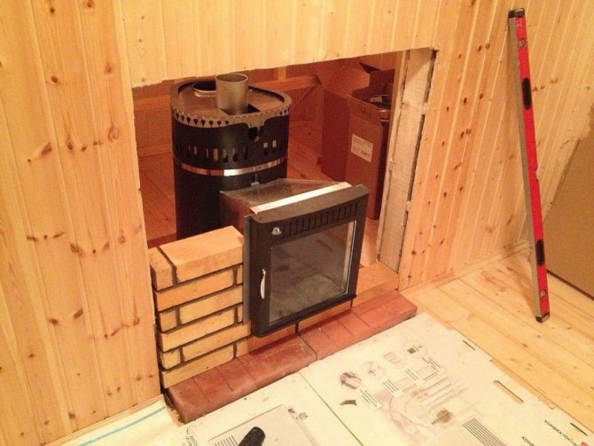 Installation af en komfur i et bad med en ekstern brændkammer